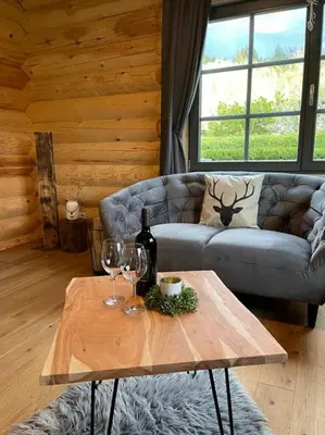 Ein Sitzbereich in der Unterkunft Das Landchalet