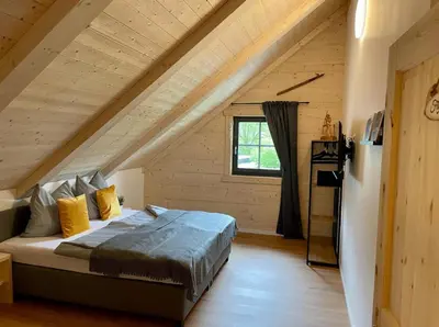 Ein Bett oder Betten in einem Zimmer der Unterkunft Das Landchalet