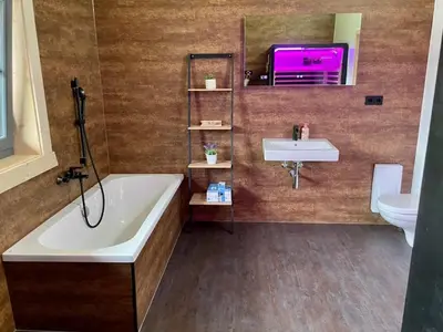 Ein Badezimmer in der Unterkunft Das Landchalet