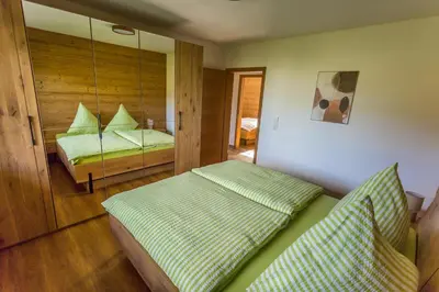 Ein Bett oder Betten in einem Zimmer der Unterkunft Chalet Hüttenzauber