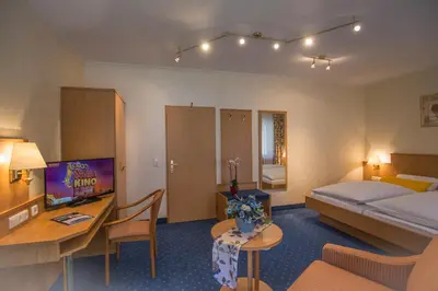 Ein Bett oder Betten in einem Zimmer der Unterkunft Gasthof Rodachtal mit Gästehaus Katharina