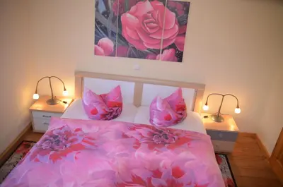 Ein Bett oder Betten in einem Zimmer der Unterkunft Ferienhäuser Schneeberger