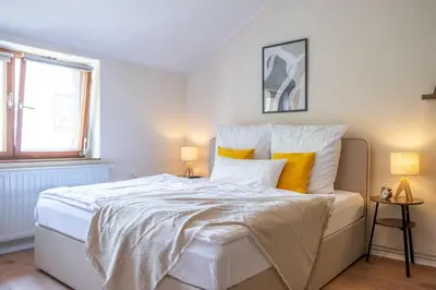 Ein Bett oder Betten in einem Zimmer der Unterkunft Familienwohnung im Vogtland
