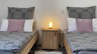 Ein Bett oder Betten in einem Zimmer der Unterkunft Ferienhaus Marktredwitz