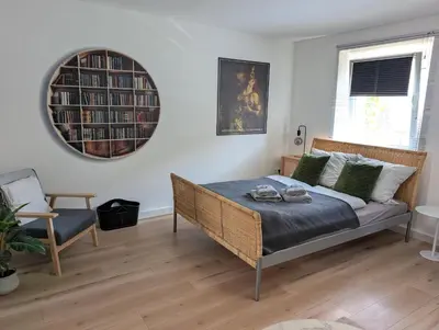 Ein Bett oder Betten in einem Zimmer der Unterkunft Wallfried #1 Ferien- und Business Appartement Bayreuth