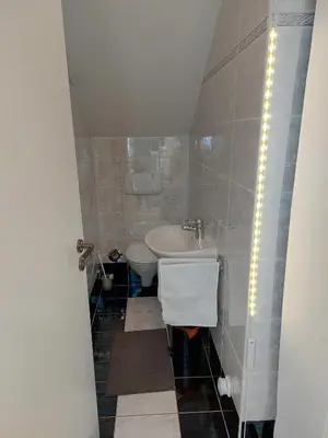 Ein Badezimmer in der Unterkunft Ferienwohnung DG