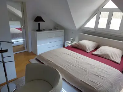 Ein Bett oder Betten in einem Zimmer der Unterkunft Ferienwohnung DG