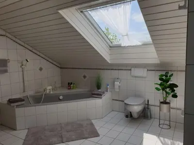 Ein Badezimmer in der Unterkunft Moderne DG-Wohnung in Mainleus