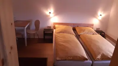 Ein Bett oder Betten in einem Zimmer der Unterkunft Haus Waldschänke