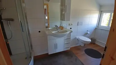 Ein Badezimmer in der Unterkunft Haus Waldschänke