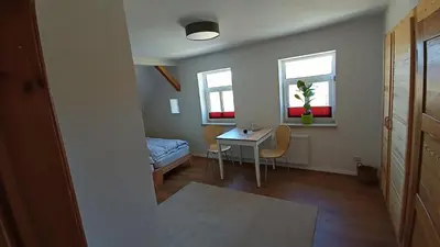 Ein Sitzbereich in der Unterkunft Haus Waldschänke