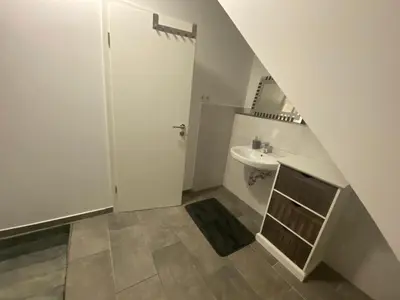 Ein Badezimmer in der Unterkunft Colmdorf 14a Ferienhaus