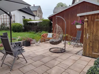 Ein Garten an der Unterkunft FeWo Ruhe-Insel Musikwinkel