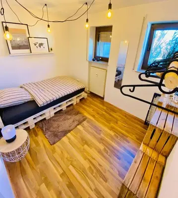 Ein Bett oder Betten in einem Zimmer der Unterkunft Moderne Wohnung in Bayreuth