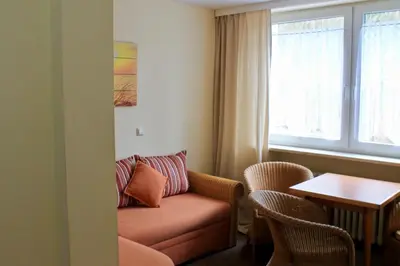 Ein Sitzbereich in der Unterkunft Hotel Carolaruh