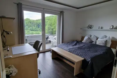 Ein Bett oder Betten in einem Zimmer der Unterkunft Idyllischen Ferienwohnung mit Weitblick und Sauna