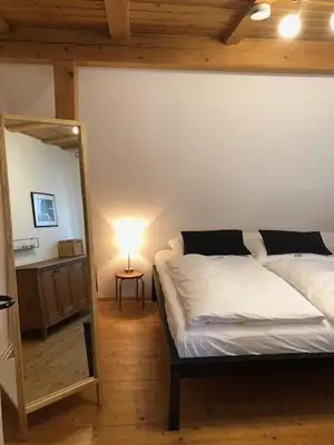 Ein Bett oder Betten in einem Zimmer der Unterkunft Ferienwohnung Beim Bienagassl