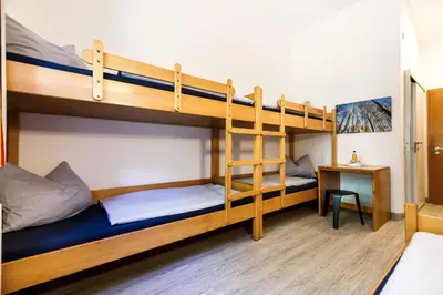 Ein Bett oder Betten in einem Zimmer der Unterkunft Jugendherberge Wunsiedel