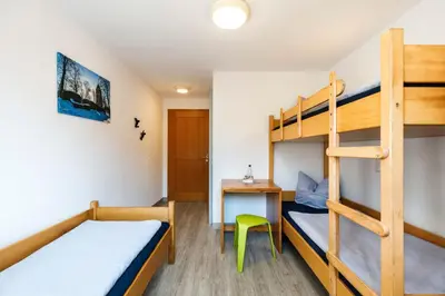 Ein Bett oder Betten in einem Zimmer der Unterkunft Jugendherberge Wunsiedel