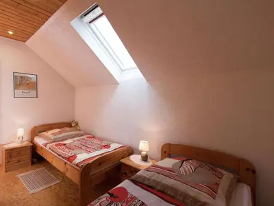 Ein Bett oder Betten in einem Zimmer der Unterkunft Ferienwohnung RiPa Erzgebirge in Schwarzenberg