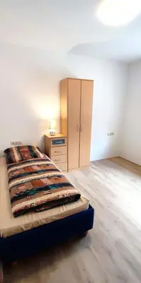 Ein Bett oder Betten in einem Zimmer der Unterkunft Zur Elster 1