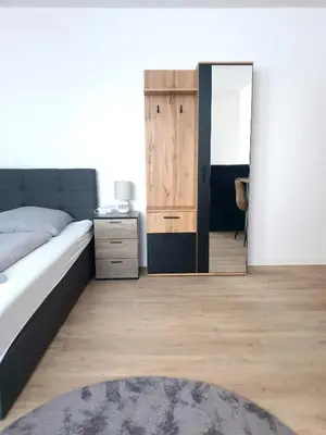 Ein Bett oder Betten in einem Zimmer der Unterkunft Zur Elster 2
