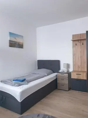 Ein Bett oder Betten in einem Zimmer der Unterkunft Zur Elster 2