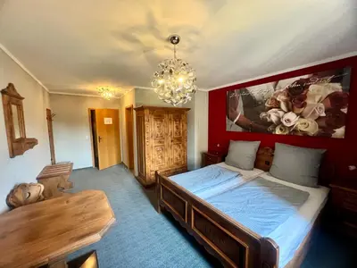 Ein Bett oder Betten in einem Zimmer der Unterkunft Hotel das rot