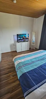 Ein Bett oder Betten in einem Zimmer der Unterkunft Mara