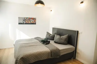 Ein Bett oder Betten in einem Zimmer der Unterkunft Shine Apartment Wackersdorf I