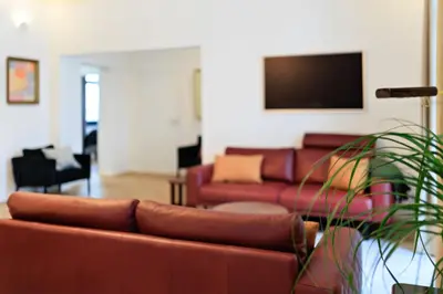 Ein Sitzbereich in der Unterkunft 5 Sterne Ferienwohnung Schlossplatz - Sachsen Vogtland Erzgebirge 6 Personen 3 SZ Sauna Kamin