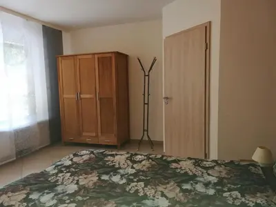 Ein Bett oder Betten in einem Zimmer der Unterkunft Ferienwohnung Hopfengärtner