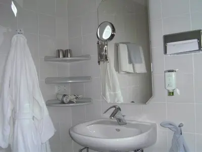Ein Badezimmer in der Unterkunft Hotel Ambiente
