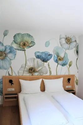 Ein Bett oder Betten in einem Zimmer der Unterkunft Gasthof Berghof