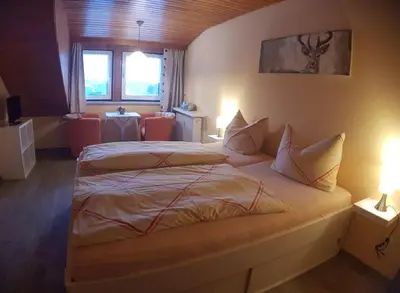 Ein Bett oder Betten in einem Zimmer der Unterkunft Haus Rosenbühl