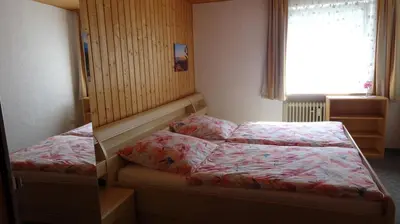 Ein Bett oder Betten in einem Zimmer der Unterkunft Haus Rosenbühl