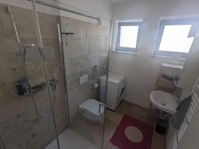 Ein Badezimmer in der Unterkunft Wohnung mit Terrasse und eigenem Parkplatz