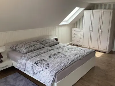 Ein Bett oder Betten in einem Zimmer der Unterkunft Ferienhaus Wernesgrün