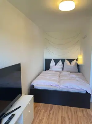 Ein Bett oder Betten in einem Zimmer der Unterkunft Ferienwohnung in Antonshöhe, Nahe Stoneman