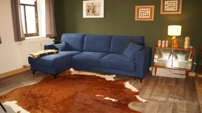 Ein Sitzbereich in der Unterkunft Ferienwohnung Ida Pfeiffer