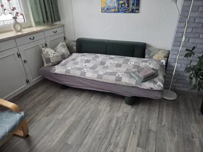 Ein Bett oder Betten in einem Zimmer der Unterkunft Ferienwohnung, Urlaub im Frankenwald