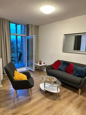 Ein Sitzbereich in der Unterkunft Ferienwohnung BX