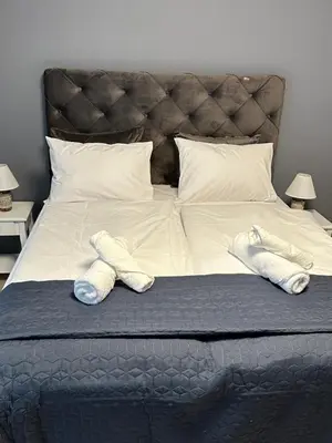 Ein Bett oder Betten in einem Zimmer der Unterkunft Ferienwohnung BX