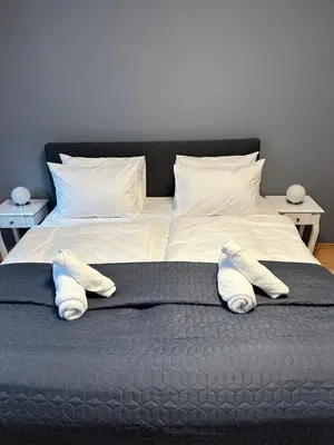 Ein Bett oder Betten in einem Zimmer der Unterkunft Ferienwohnung BX
