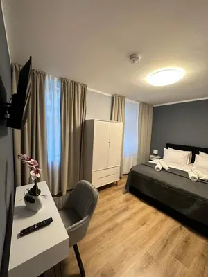 Ein Bett oder Betten in einem Zimmer der Unterkunft Ferienwohnung BX