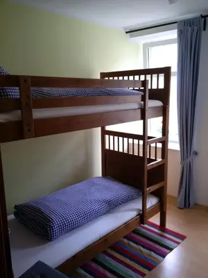 Ein Bett oder Betten in einem Zimmer der Unterkunft Ferienwohnungen Haus Sebastian