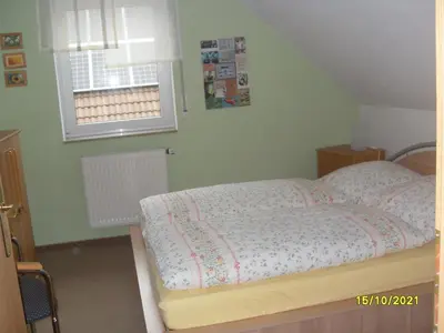 Ein Bett oder Betten in einem Zimmer der Unterkunft Dorfstraße 15