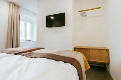Ein Bett oder Betten in einem Zimmer der Unterkunft STADTQUARTIER Windischeschenbach