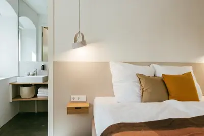 Ein Bett oder Betten in einem Zimmer der Unterkunft STADTQUARTIER Windischeschenbach