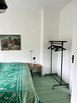 Ein Bett oder Betten in einem Zimmer der Unterkunft Grüne Villa